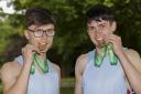 St.Michaels Athletics Jack O'Connor, 100m and Sean Corry 800m with their gold medals in The Irish Schools Championships.