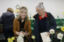 Patricia Neill and Caroline Nicholson capturing the flowers on camera at the show.
