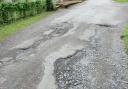 A familiar sight on many Fermanagh roads: potholes. File photo.