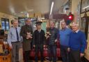 Gordon Johnston (barber) with Neil Morrissey, Nigel Johnston (barber), Adrian Dunbar, Selwyn Johnston and Alan Devers (Headhunters Railway Museum).