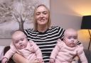 Alison McQuade and her five-month-old twins, Lily and Ella.