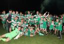 Strathroy Harps Reserves celebrate after winning the Reihill Cup.