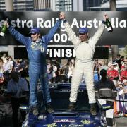 Subaru PWRC driver Niall McShea and co-driver Michael Orr celebrate winning the 2004 title  leg three, Telstra Rally Australia 2004.