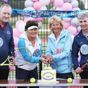 Cutting the cake on the 30th anniversary of Irvinestown Tennis Club are from left, John Maguire, Kathleen Maguire, Kate Heaver and Michael Duffy..