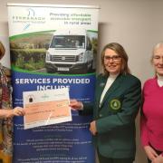 From left to right, Cathy Magowan, Chairperson Fermanagh Community Transport, Kathleen Timoney, Lady Captain and Myrtle Chambers Lady Vice-Captain of Castle Hume Ladies Golf Club.