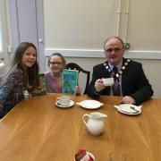 Amy Noble with her big sister, Holly, and Councillor McElduff.