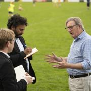 Comedians Josh Widdicombe and Nish Kumar interview actor Adrian Dunbar at Brewster Park as part of their programme, ' Hold The Front Page'. Image: Sky