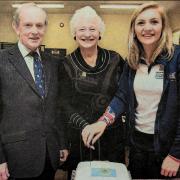 Lord Lieutenant for Co. Fermanagh, Viscount Brookeborough, with guests Dame Mary Peters and Holly Nixon cutting the cake. Dame Mary Peters had come to Tamlaght as part of a tour of the area, where she extolled the Commonwealth’s empowerment and