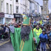 St. Patrick waving to the crowds in Enniskillen as he leads the Celebrations.