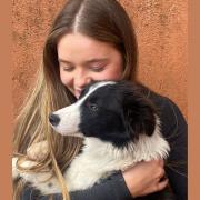 Bright Eyes Animal Sanctuary volunteer with Ralf the Collie.