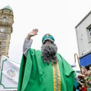 St. Patrick waving at onlookers at the Diamond, Enniskillen.