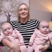 Alison McQuade and her five-month-old twins, Lily and Ella.