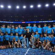 Kyran Maguire (back, fifth from right) with ATP World Tours final winner Andy Murray
