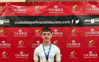 Darragh Love posing with his gold medal in Spain