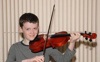 Daire Dunne from Tempo. 1st in the fiddle in the U12.