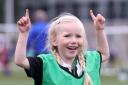 Celebrating her goal during the IFA Soccer Camp at the Forum.