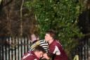 Enniskillen's Matthew Graham and Jack Rutledge making a tackle in the game against CIYMS on Saturday.
