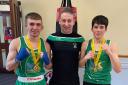 Ederney coach Oliver Kelly with Ulster champions Luke Duncan and Charlie McNulty.