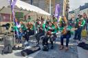 Roslea CCE musicians performing on the Diamond, Enniskillen on St. Patricks Day.
