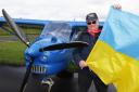 Flying Farmer, Roger Bell, with his Ukraine flag on his visit to Co.Fermanagh. His aircraft was built in Ukraine.