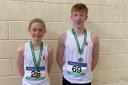 Annabele Morrison and Frank Buchanan with their medals from the Tailteann Games.