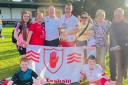 Marty McGrath with family members after helping Tyrone to the All Ireland Masters title.