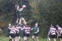 David Stinson is hoisted high to secure the lineout for the Valley