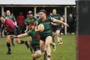 Michael Treanor bursts through to score a try for Clogher Valley