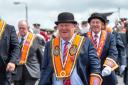 Bro. David Mahon, owner of Castle Archdale Caravan Park and Camping Site, parading with Co. Donegal Grand Orange Lodge at Rossnowlagh.