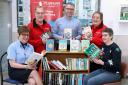 Launching the book corner are; (front) Lynda Collum, Ulsterbus Clerk; and Paula Kerr, Fermanagh Book Swappers, with (back) Barry Barnes, AANI volunteer; Dermot McGirr, Dermot McGirr, Service Delivery Manager, Translink; and Avril Stubbs, AANI volunteer.