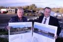 Ronnie Crawford, Crawford Marina Ltd, with Nicky Cassidy, Cassidy Hospitality Group, holding some of the proposed redevelopment plans. Photo by John McVitty.