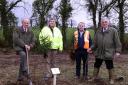 James Hamilton Stubber, (right), Chairman of The Queens Greens Canopy Project Northern Ireland, planting Birch, Spruce and Rowan trees with from left, Viscount Brookeborough DL, Brian Murphy, CEO BALCAS and Nigel Manley, Head of Forestry BALCAS.
