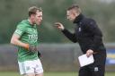 Cian McManus receives instructions from Kieran Donnelly.