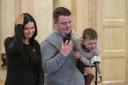 Daithi MacGabhann and his parents Mairtin MacGabhann and Seph Ni Mheallain at Parliament Buildings at Stormont, after a recall failed to nominate a Speaker of the Northern Ireland Assembly. The failed bid to restore the Assembly thwarted the chances of