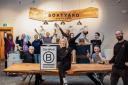 The Boatyard Distillery team celebrating the company recently earning B Corporation certification for sustainability.