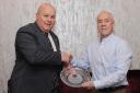 Paul McAnea is presented with his Services to Football award by Neil Jardine, Chairman of the F & W Football League.