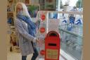 Enniskillen woman Nuala O'Toole pictured with The Kindness Postbox.