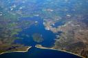 The public is being urged to avoid using the water and beaches within Poole Harbour in Dorset, south-west England, after an oil leak caused a major incident to be declared (Alamy/PA)