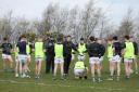 Niall McElroy taks to his players at training on Saturday at Lissan.