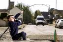 Seven-year-old Henry takes advantage of the good weather to do a spot of fishing in the large pothole at Castle Lane, Lisnaskea. Photo by John McVitty.