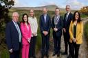 Pictured against the backdrop of Cuilcagh Mountain, are (left to right): Brendan Smith, TD; Cllr Áine Smith TD; Alison McCullagh, Chief Executive, Fermanagh and Omagh District Council; Tánaiste Micheál Martin, TD; Cllr John Paul