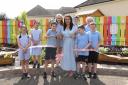 Sophie Connolly, Sharleen Carroll, Darragh Connolly , Conor Boyle, Orla Murphy, Conor Moane, James O'Rourke and Isabelle. All members of the Eco Council cutting the ribbon to officially open the ECO garden. Also in the photo is the Principal, Mrs.