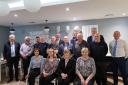 The longserving Donnelly Group staff, including five members from Enniskillen, who were recently honoured for working more than three decades with the company.