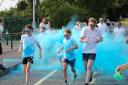 Participants enjoying the colour run in Derrygonnelly.