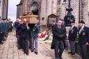 The remains of Major George Stephens is carried by Association members of The Ulster Defence Regiment and Royal Inniskillen Fusiliers as it leaves St.Macartin's Cathedral, Enniskillen.