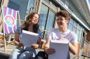 St. Kevin's College students Ellie Woods and Mikolaj Jagusiak receiving their A-Level results.