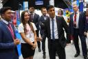 Prime Minister Rishi Sunak tours the Exhibitor’s Hall at the Manchester Central convention complex during the Conservative Party annual conference (Carl Court/PA)