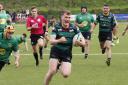 Robbie Mills, back from injury cuts through the Ballina defence to score for Clogher Valley