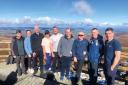 50 Mannok employees walked up the Cuilcagh Broadwalk Trail in Aran Sheridan's memory, with money raised going to the Kevin Bell Repatriation Trust
