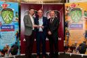 Alan Carroll of Allianz presents Liam Magee with the Fermanagh Cumann na mBunscol award with National Cumann na mBunscol Chairman Joe Lyons.